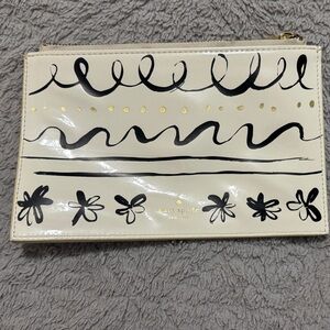Kate Spade Cream Clutch with Black and Gold Accents